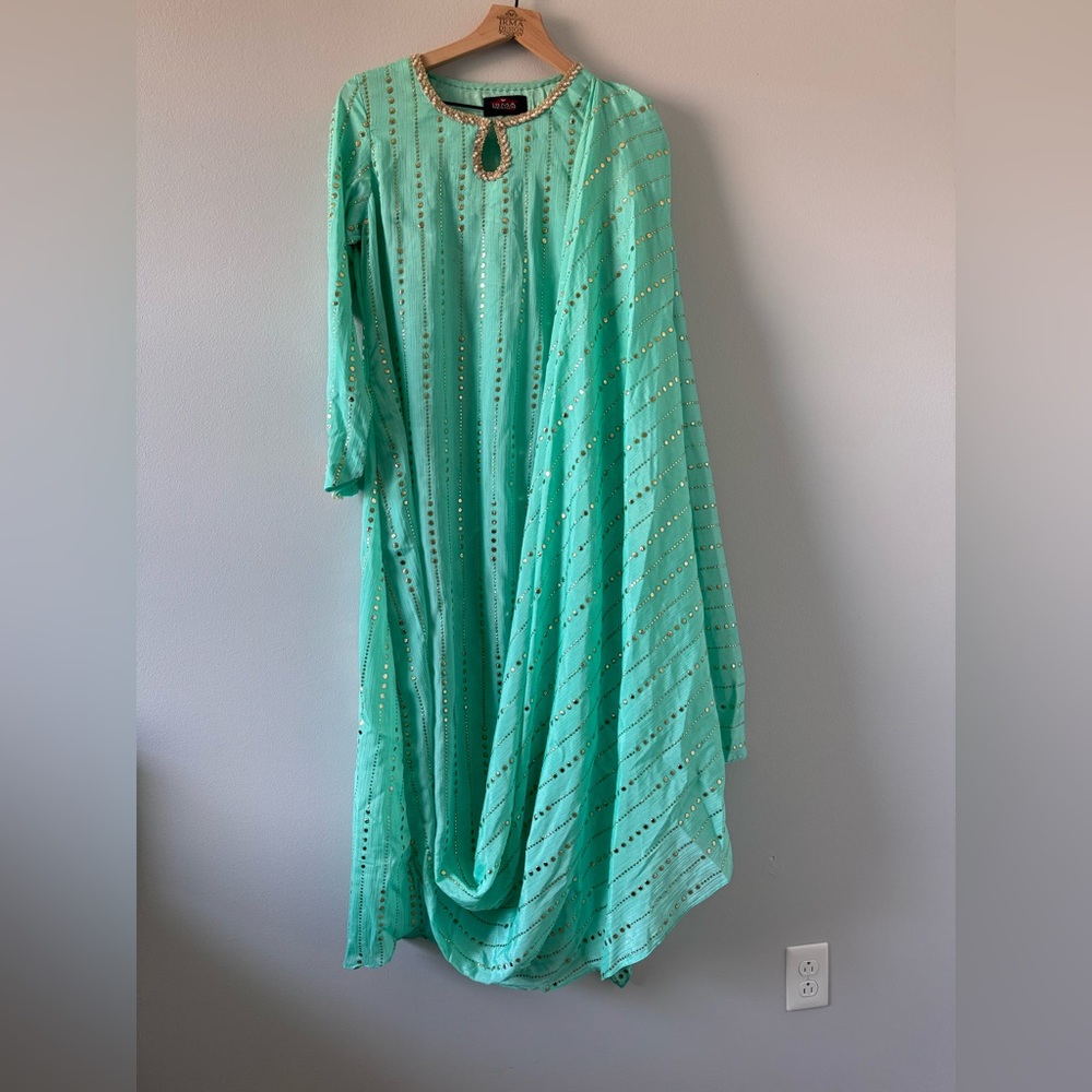 Elegant Mint Green Dress with Gold Accents